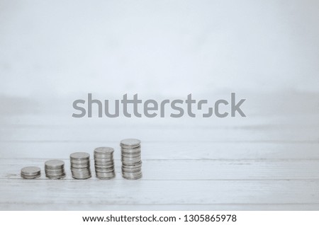 5 rows of coins arranged in ascending order.