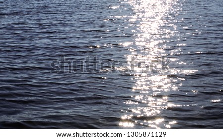 Sea water texture in sunrise light