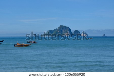 Picture of boats on sea water.