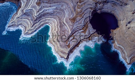 Aerial View to the Salty Dead Sea Side near the Ein Bokek, Israel  Royalty-Free Stock Photo #1306068160