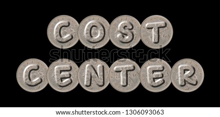 COST CENTER – Five new pence coins on black  background