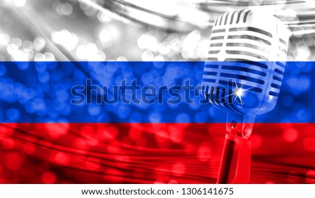 Microphone on a background of a blurry Russia flag close-up