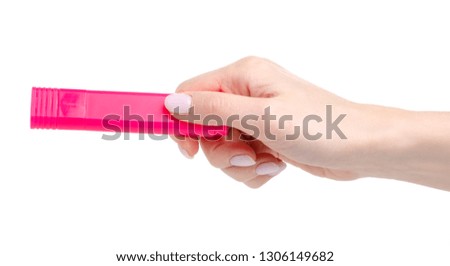 Pink marker in hand on white background isolation