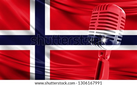 Microphone on fabric background of flag of Norway close-up