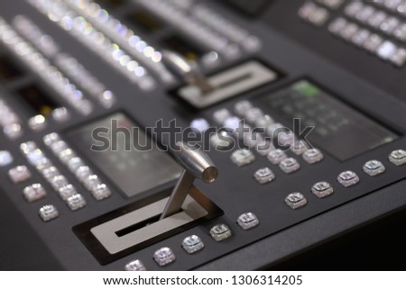 Closeup view of digital video switcher control panel. Selective focus.