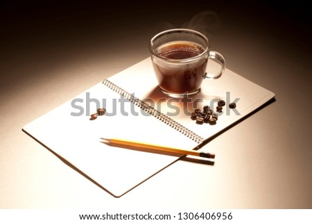 coffee bean and note