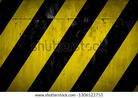 yellow and black paint, metallic background