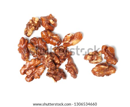 Amber walnut kernel on White Background