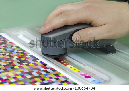 spectrophotometer verify color patches on Test Arch, Press shop prepress department