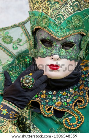 Reveller In Traditional Elaborate Mask And Costume At Venice Carnival (Carnevale di Venezia). Venice, Veneto, Italy, Europe