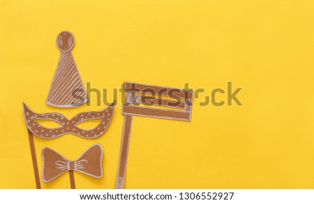 Purim celebration concept (jewish carnival holiday). Traditional symbols shapes cutted from paper