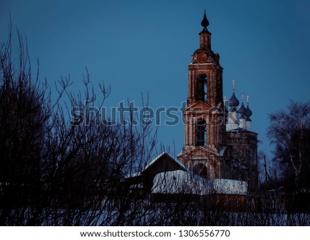Night picture of an old abandoned church in russian village