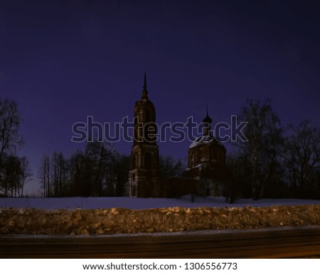 Night picture of an old abandoned church in russian village