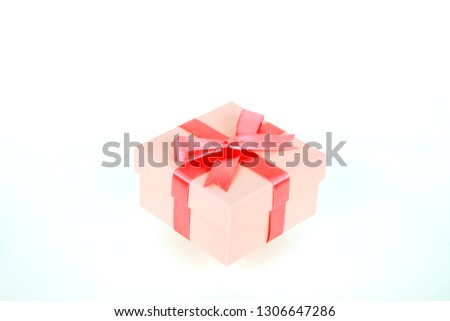 gift box with red bow and white background