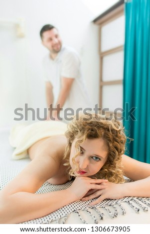Female patient enjoying her massage.