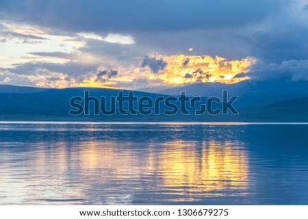 Mongolia. Lake Khubsugul at sunset. Gold hour.

