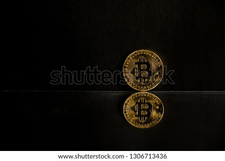 bitcoin coin on a black background