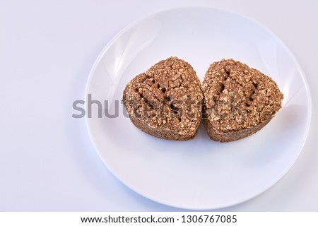 wheat germ bread and rye on a white round plate. healthy food. bread.