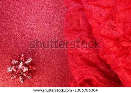 Red art background. Festive shiny background. Red bow            