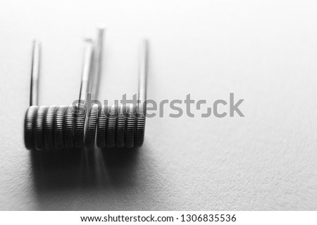 vape spiral coils wires for electronic cigarette, e-cigarette, vaping background.