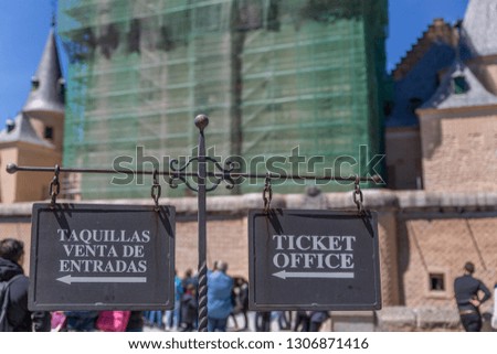 Posters indicating where the ticket offices are and the ticket office in front of some monuments, Spain
