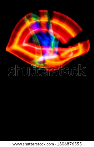 black background and light abstract patterns rainbow colorful, copy space, menu, freezelight drawing colored light