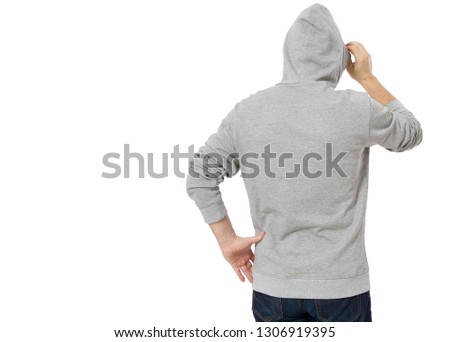 Man in template mens hoodie sweatshirt isolated on white background. Man in blank sweatshirt hoody with copy space and mockup for design logo print, back view.