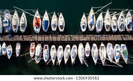 Aerial view of yachts in the marina.