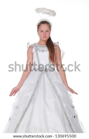 Pretty young girl in a white dress angel on white background
