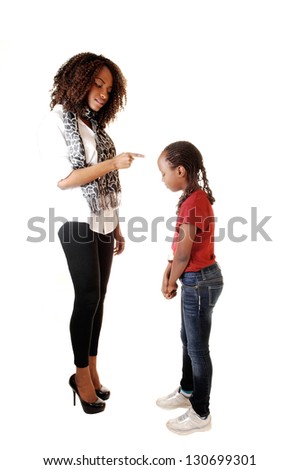 A big sister is lecturing her small sister, standing for white background
