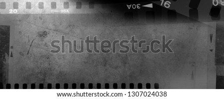 Film negative frames on grey background