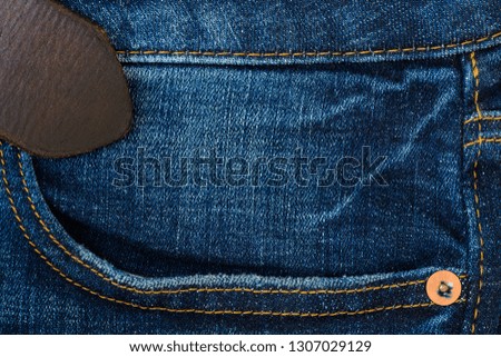 Close up of blue denim jeans, denim jeans texture.