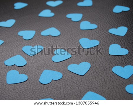 Isolated Wblue Paper Shapes on a Black Background
