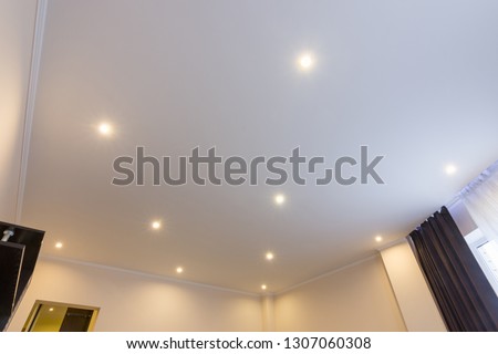 Ceiling in the hall, lighting is on Royalty-Free Stock Photo #1307060308