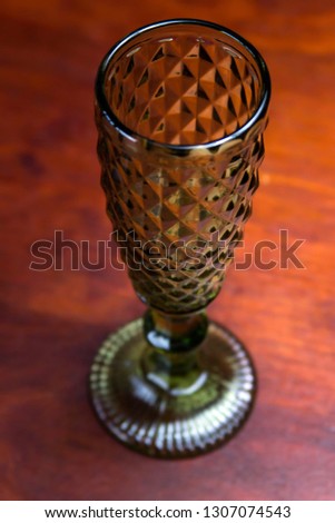 champagne glass on red table