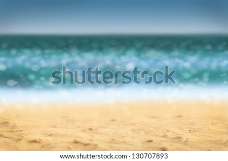 Summer holidays background - beach and sea, defocused.