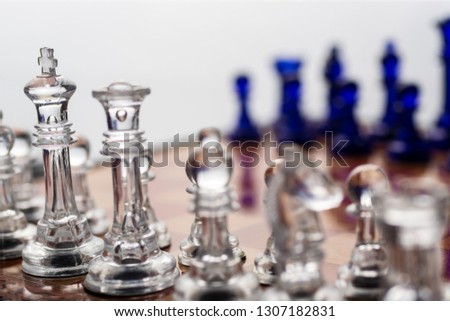 Chess pieces closeup, with out of focus background, dark and white pieces