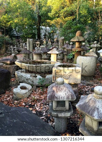 Stone lanterns Stone basins graveyard in Kyoto Japan