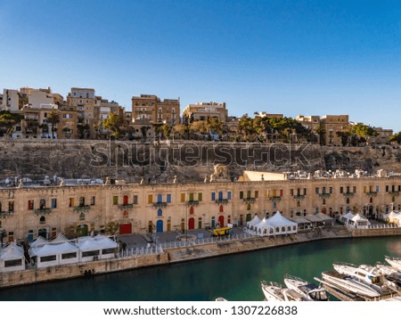 The Valletta Waterfront, is a promenade in Floriana, Malta, mainly featuring three prominent buildings. The area is now a hub in Malta's cruise liner business as the Forni Cruise Passenger Terminal.