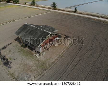 Aerial view of paddy field in Sungai Besar, Selangor, Malaysia. This picture was taken after the paddy field land was plowed and before water filling.