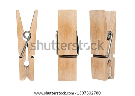 Set of decorative wood clothespins isolated on white background Royalty-Free Stock Photo #1307302780