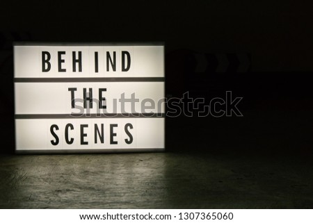Cinema light box in dark tone film content.