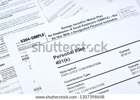 Tax reporting and retirement plan. Personal plan 401k form on against background 5304-simple tax form and other forms Royalty-Free Stock Photo #1307398648
