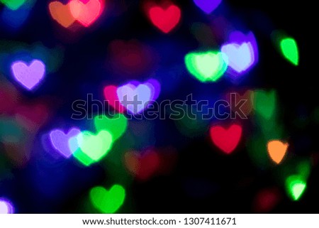abstract background love colorful blurred heart shaped lights. Valentines Day background