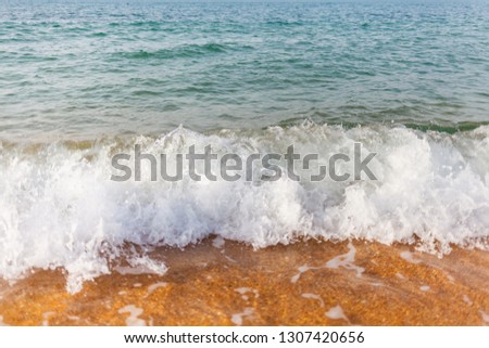 Sea waves in the sand large. The storm is coming. Ocean is shaking
