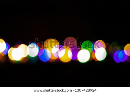 Golden and colorful bokeh,Lights Sparkled Abstract Design Dackground