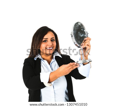 Happy young business woman holding a dirty mirror against a white background