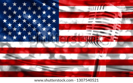 Microphone on a background of a blurry USA flag close-up