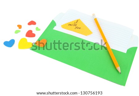 Note in envelope with pencil isolated on white