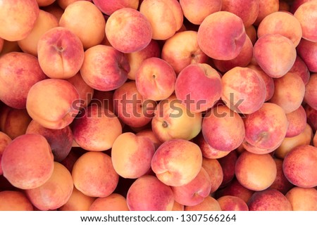 Peaches closeup background Royalty-Free Stock Photo #1307566264